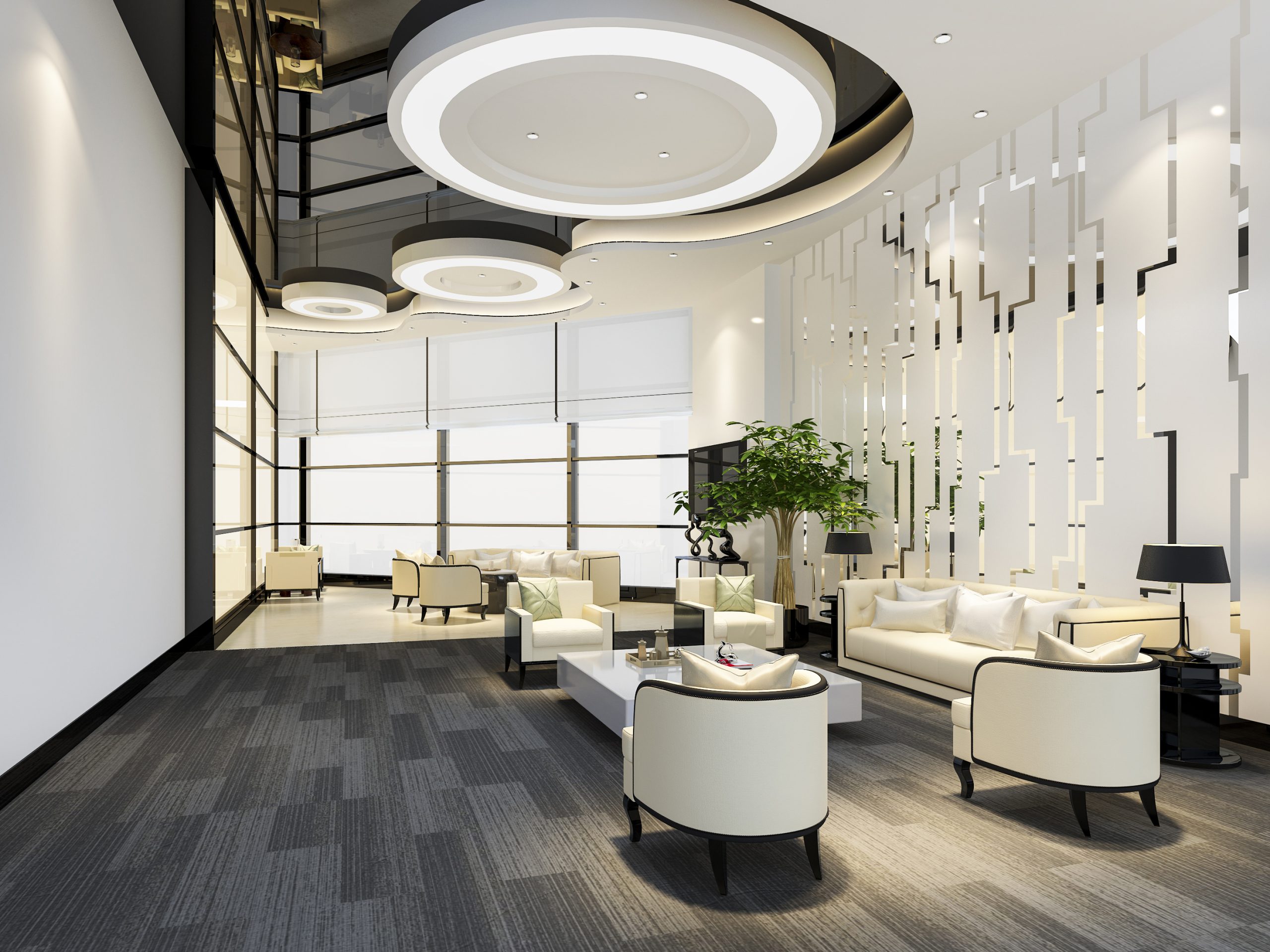 A cleaned dental office waiting area with grey carpet and white chairs.