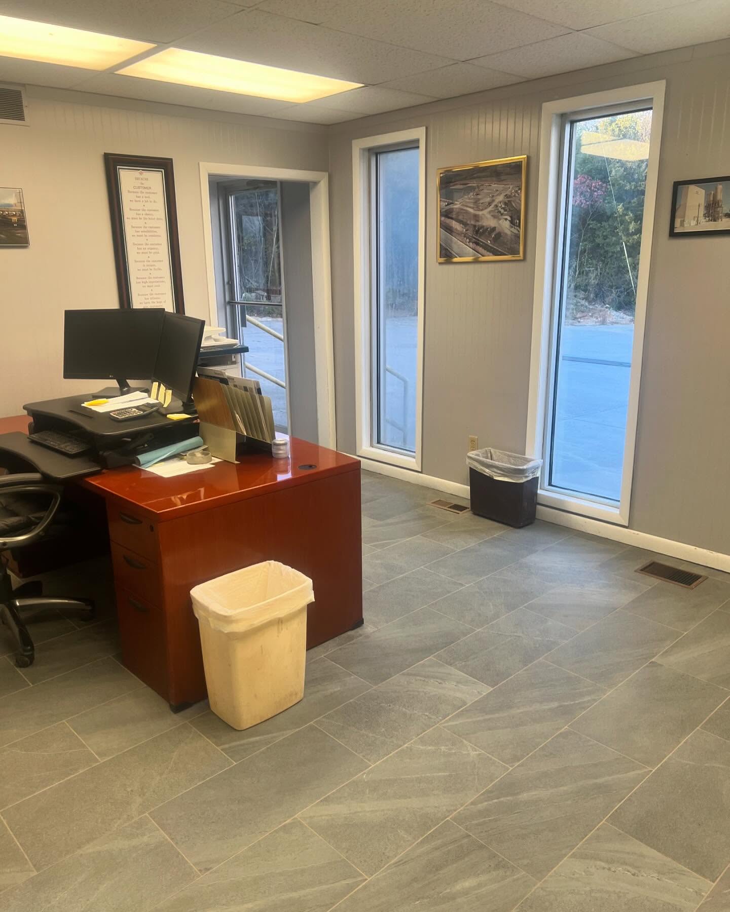 Red 2 Offices and Corporate Buildings Cleaning Services A clean office space with two clean windows.