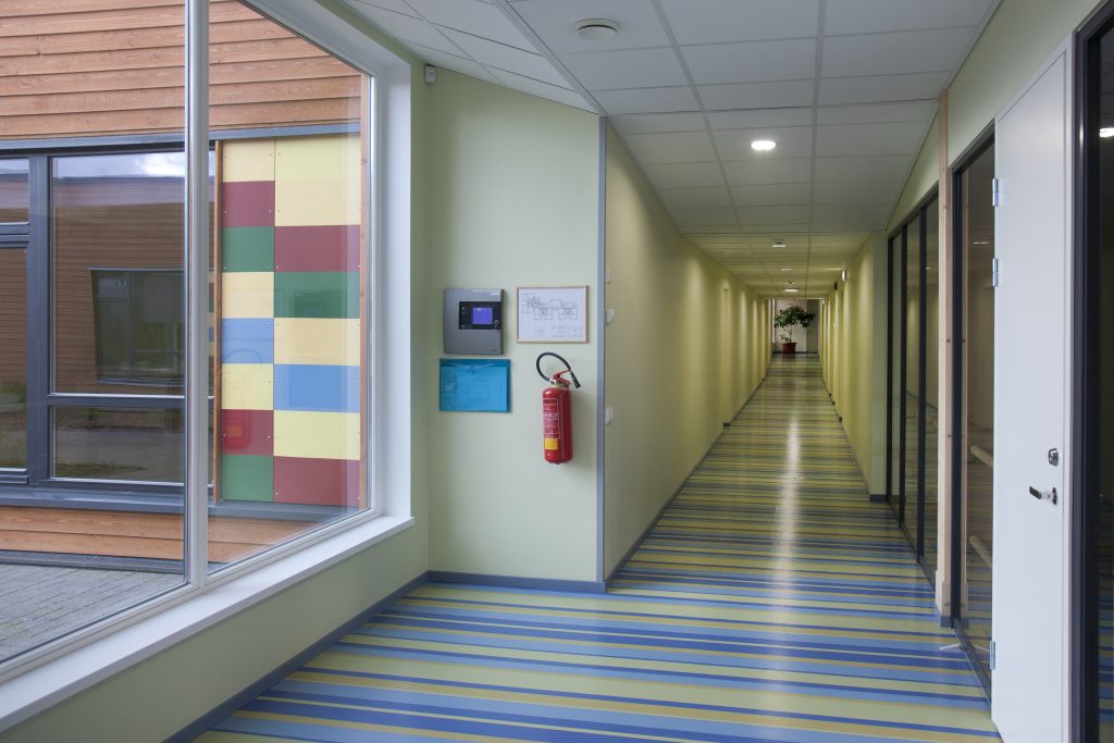 colorful school hallway with a striped floor 2023 11 27 05 32 05 utc Educational Institutions and Daycare Centers Cleaning Services