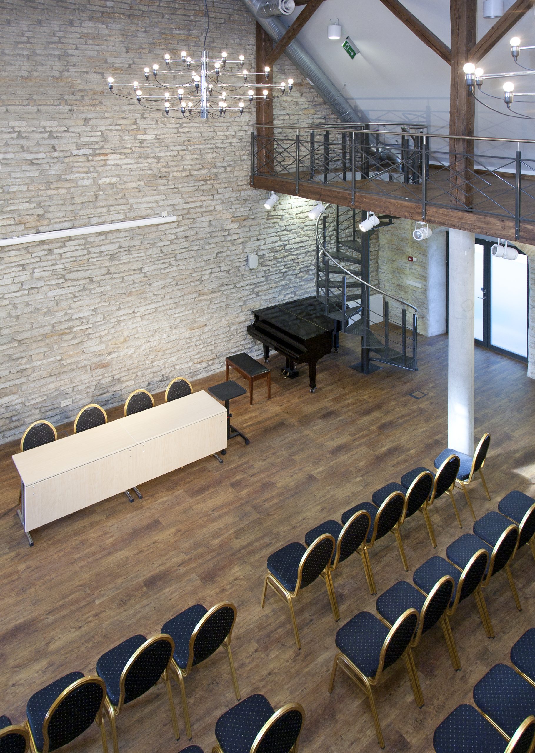 conference room seating 2023 11 27 05 18 32 utc scaled Event Venues and Banquet Halls Cleaning Conference room with spotless wooden floor, neatly stacked chairs brought together by event venue cleaning services in Louisville, KY