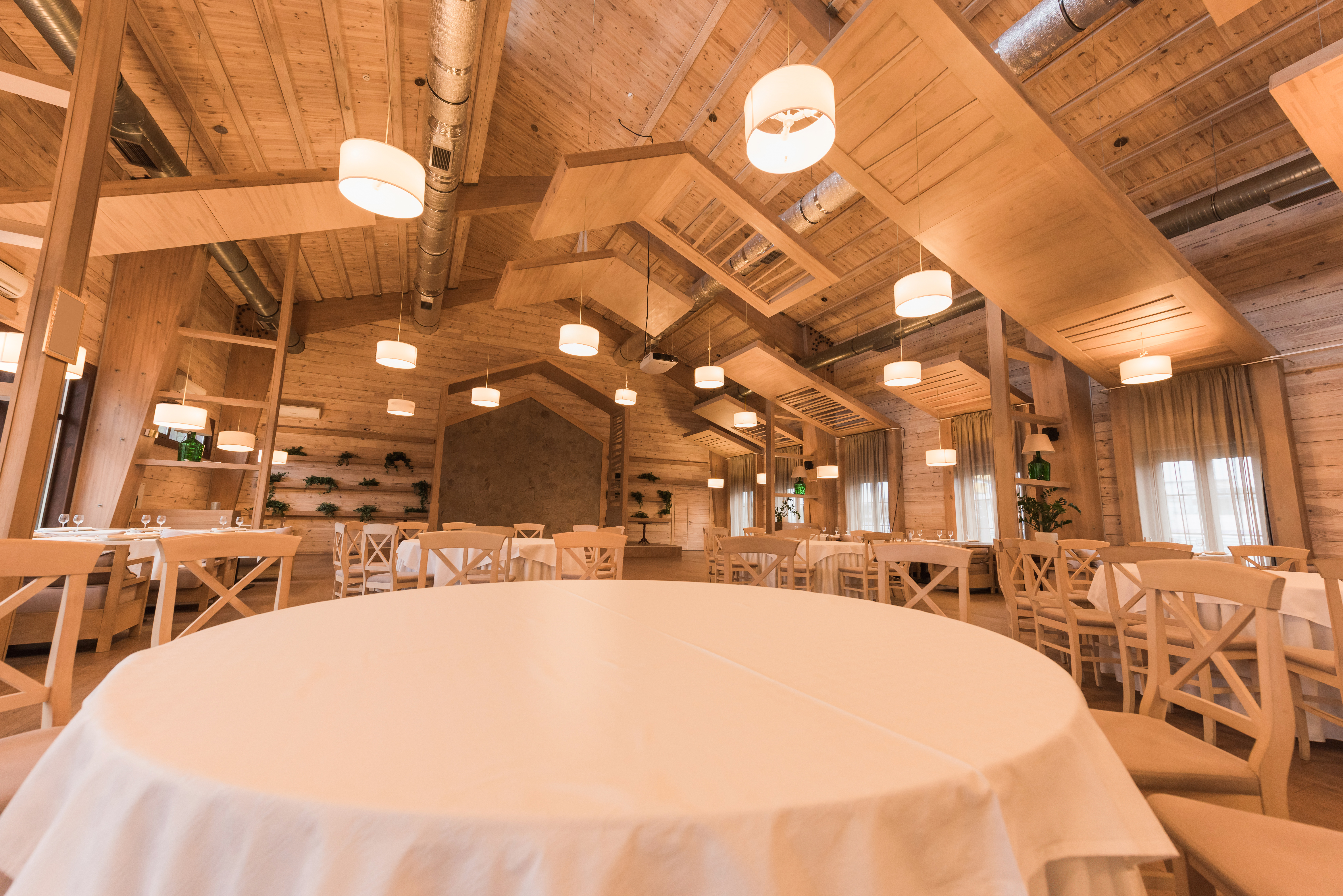 interior of modern elegant restaurant with high ce 2024 11 18 23 59 34 utc Event Venues and Banquet Halls Cleaning Spacious, clean, white-draped restaurant maintained with event venue cleaning services in Louisville, KY.