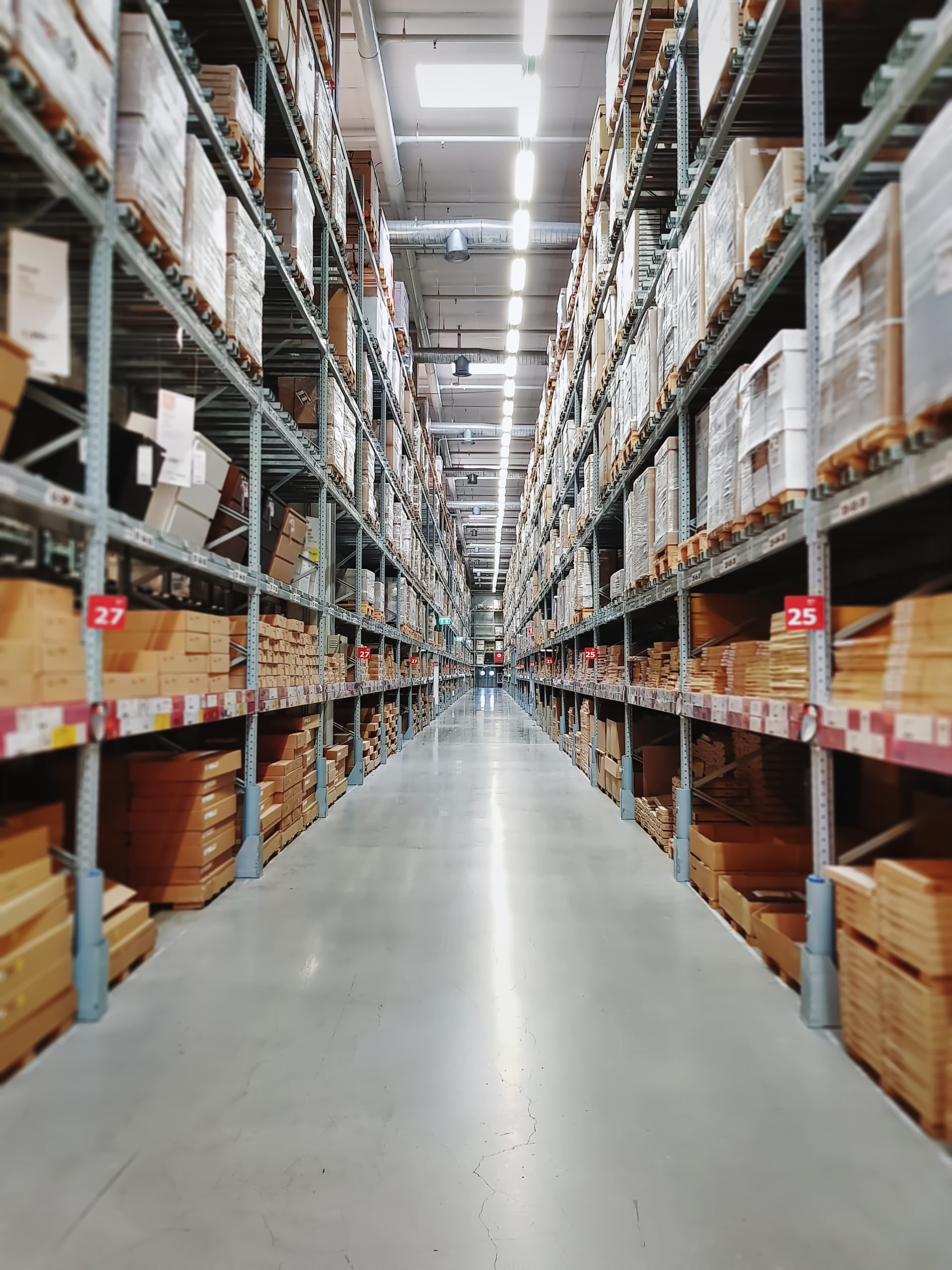 perspective view of aisle between shelves at retai 2024 05 27 01 16 33 utc scaled Warehouse and Industrial Facility Cleaning