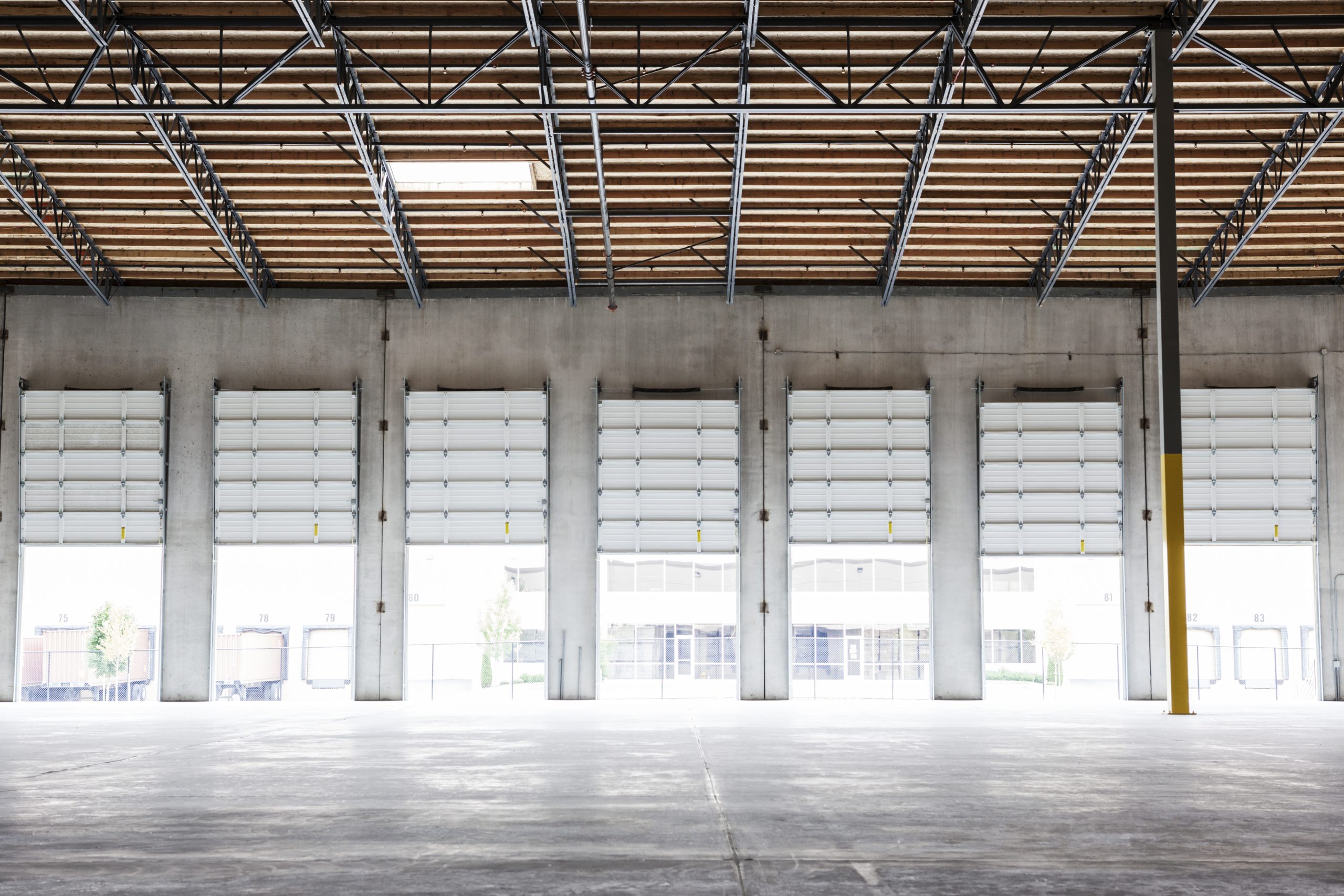wide angle interior view of largeempty warehouse a 2023 11 27 05 09 03 utc scaled Warehouse and Industrial Facility Cleaning